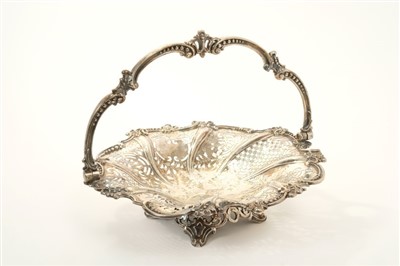 Lot 201 - Victorian silver fruit basket with pierced decoration and swing handle.