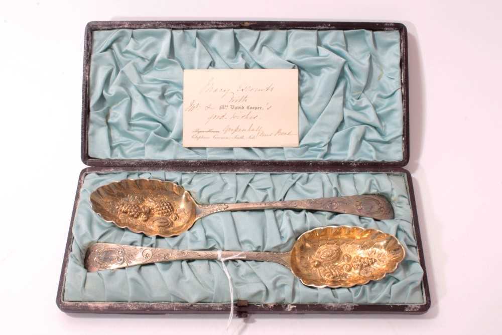 Lot 204 - Pair of Victorian silver berry spoons in fitted case