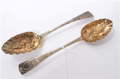 Lot 204 - Pair of Victorian silver berry spoons in fitted case