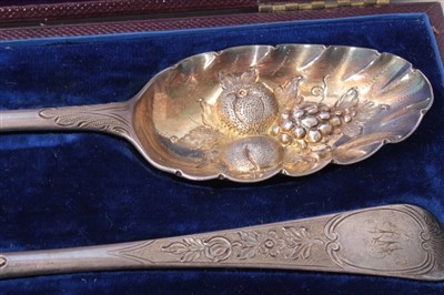 Lot 216 - Set of four Georgian silver berry spoons in fitted case (blue velvet)