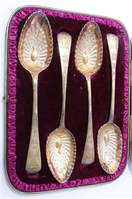 Lot 214 - Set of four silver gilt serving spoons with peacock bowls (pink velvet)