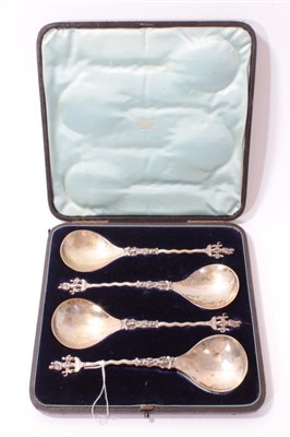 Lot 215 - Set of four 19th century Continental silver apostle spoons in fitted case