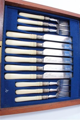 Lot 92 - A set of plated dessert knives and forks in case