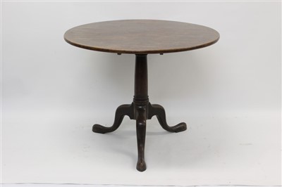 Lot 1321 - George II mahogany tripod table with circular snap top on canon barrel support