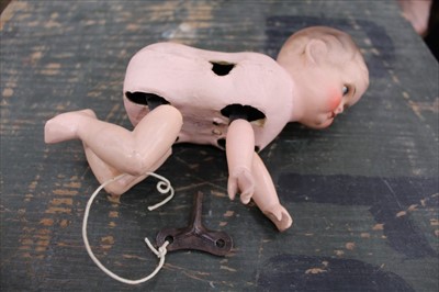 Lot 2849 - German mechanical crawling baby and key.