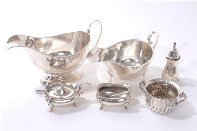 Lot 350 - Two silver sauce boats, three piece silver cruet and another silver salt