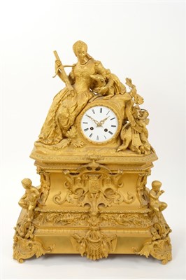 Lot 658 - An impressive nineteenth century ormolu clock with enamel dial, seated female with crossbow and dog mount, in ornate scroll case with putti mounts