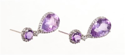 Lot 471 - Pair of amethyst and diamond pendant earrings