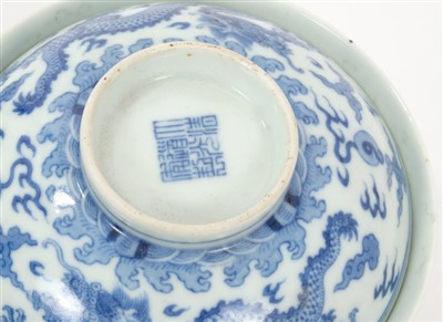 Lot 13 - Pair 19th century Chinese blue and white bowls and covers with continuous five toed dragons chasing pearls amid clouds