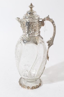 Lot 234 - Victorian silver mounted clear glass claret jug with  "rock crystal" decoration