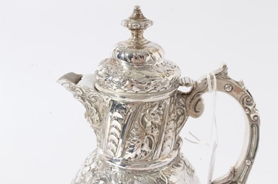 Lot 142 - Victorian silver mounted clear glass claret jug with  "rock crystal" decoration