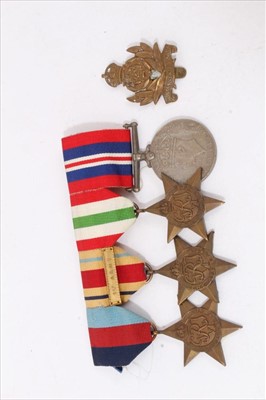 Lot 506 - Second World War medal group, comprising 1939 - 1945 Star, Africa Star with 1st Army clasp, Italy Star and War medal (mounted on bar) together with an Intelligence Corps cap badge