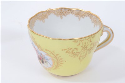 Lot 28 - Meissen tea cup and saucer with floral decoration on yellow ground