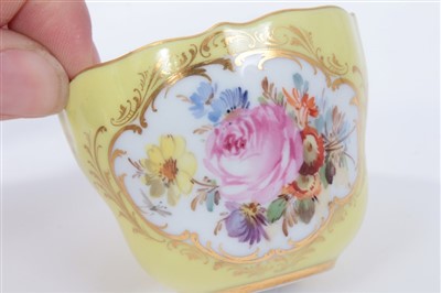 Lot 28 - Meissen tea cup and saucer with floral decoration on yellow ground