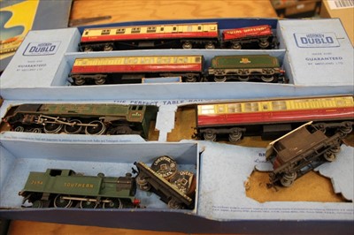 Lot 1380 - Railway Hornby Dublo electric train set in original box, unboxed carriages, rolling stock and accessories housed in large wooden trunk