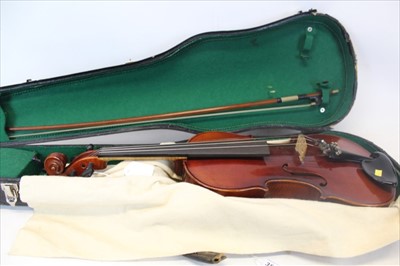 Lot 3571 - Late 19th / early 20th Century Continental violin with label - copy of Antonius Stadvarius, with bow, in fitted case.