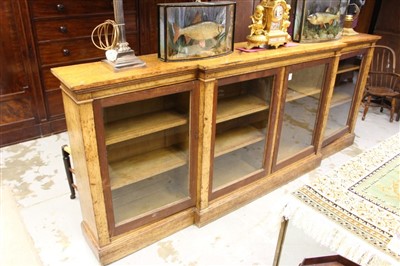 Lot 1326 - Large Victorian light oak breakfront bookcase enclosed by four glazed doors