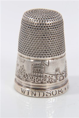 Lot 868 - Rare 19th century silver Windsor Castle thimble, with continuous frieze and engraved title, 2cm high, cased