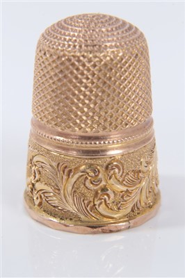 Lot 872 - 19th century gold thimble, with vacant shield shape crest and scroll ornament