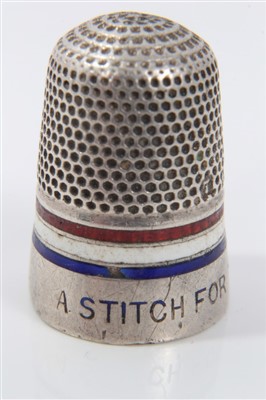 Lot 874 - Rare WWI ‘A stitch for the white and blue’ war effort thimble, with enamelled ornament, 2.5cm high