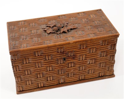 Lot 912 - 19th century Black Forest carved linden wood stationary box