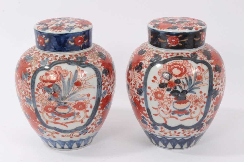 Lot 132 - Pair of Japanese Imari ovoid vases, covers and inner covers