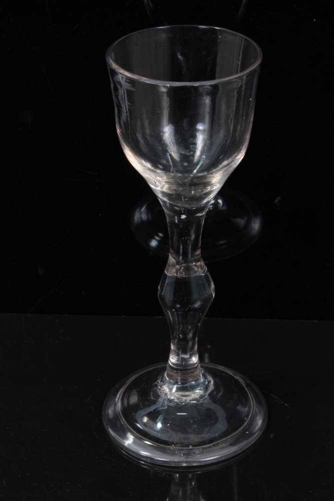 Lot 68 - 18th Century cordial glass with plain stem and centre knop on folded foot.