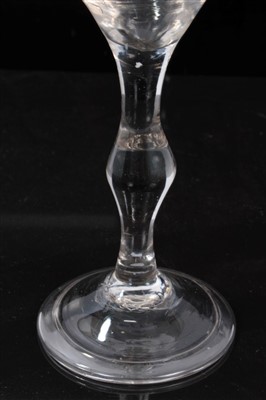 Lot 68 - 18th Century cordial glass with plain stem and centre knop on folded foot.