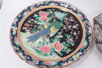 Lot 56 - Two late 19th century Japanese porcelain chargers with Chinese-style polychrome peacock and floral decoration, 43-46cm