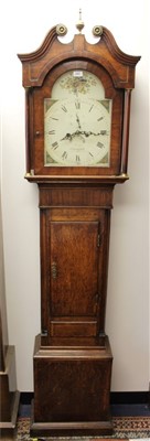 Lot 862 - Pearce of Stratford longcase clock with arched painted dial, in oak and mahogany case, with pendulum, weights and keys