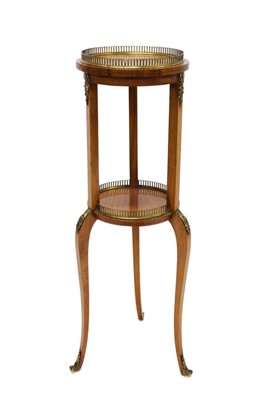 Lot 1317 - Late 19th century two tier satinwood urn stand with brass gallery and gilt mounts