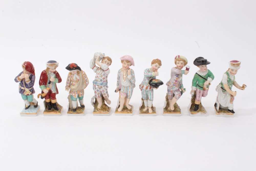Lot 88 - Nine late 19th century Dresden porcelain figures emblematic of the months and seasons of the year-each titled 10cm