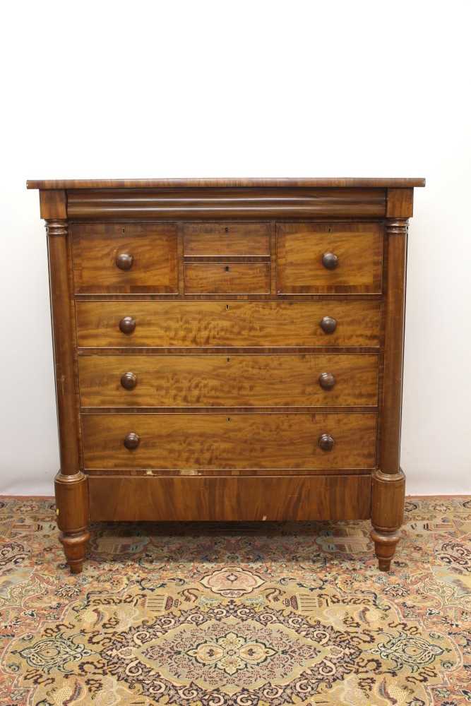 Lot 1319 - 19th century mahogany Scottish chest, having two short drawers flanked by two deep hat drawers and three graduated drawers on stand with single drawer between projecting columns, on spool feet, 133...