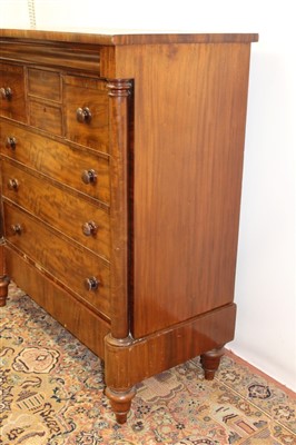 Lot 1319 - 19th century mahogany Scottish chest, having two short drawers flanked by two deep hat drawers and three graduated drawers on stand with single drawer between projecting columns, on spool feet, 133...