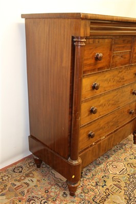 Lot 1319 - 19th century mahogany Scottish chest, having two short drawers flanked by two deep hat drawers and three graduated drawers on stand with single drawer between projecting columns, on spool feet, 133...