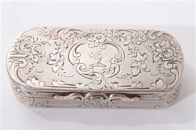 Lot 282 - Victorian silver pill box of oval form, with engraved foliate decoration and armorial crest, hinged cover and silver gilt interior. (Birmingham 1850). Cronin & Wheeler. 4.5cm across