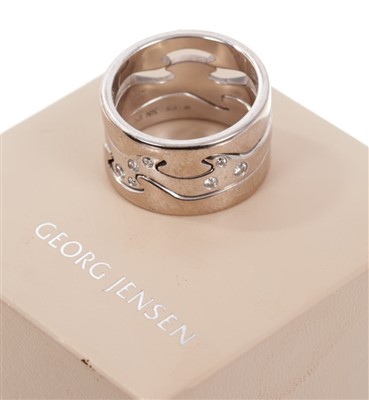 Lot 509 - Georg Jensen diamond and 18ct white Fusion ring with three interlocking rings. Signed, numbered 56 NK. Finger size approximately Q. With original box and outer box.