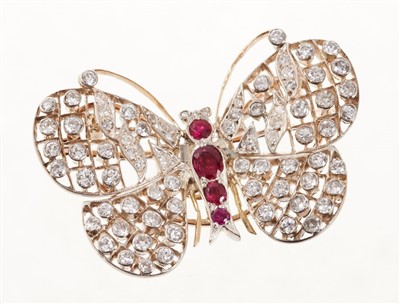 Lot 521 - Diamond and ruby butterfly brooch,  the wings with brilliant cut and old cut diamonds in openwork setting and rubies to the body, with detachable brooch fitting to the reverse. Estimated total diam...