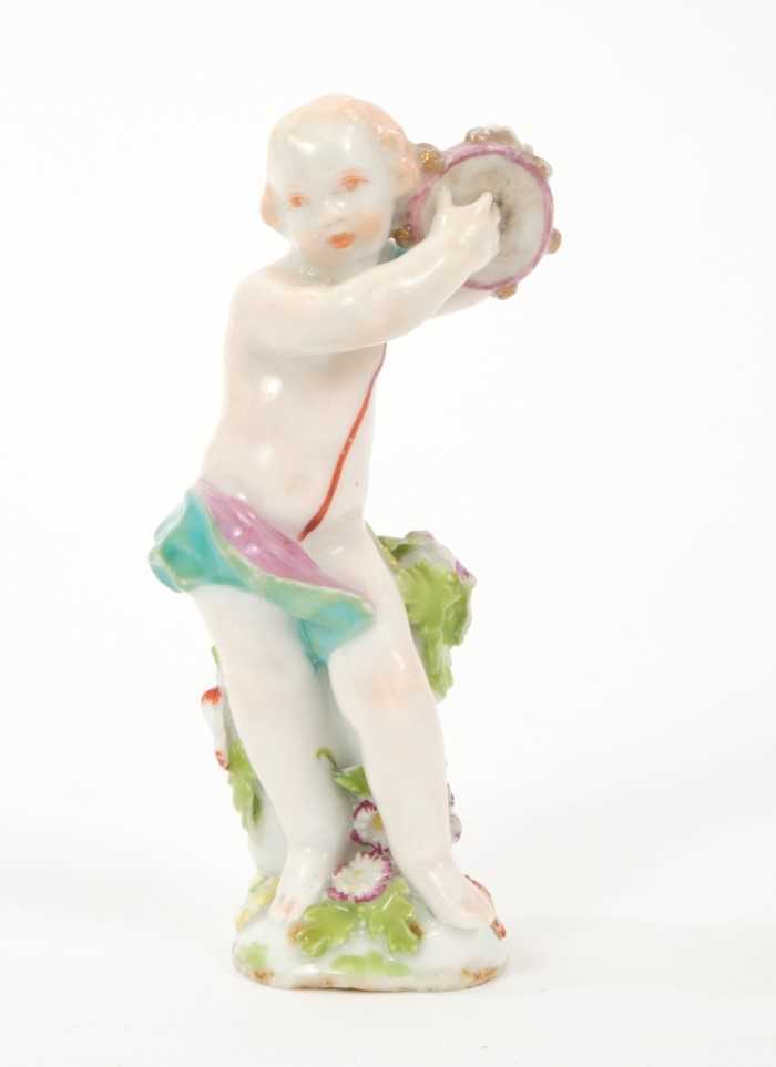 Lot 109 - 18th century Chelsea figure of a putto