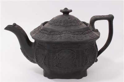 Lot 121 - Four early 19th century black basalt teapots including gothic architectural designs (4)