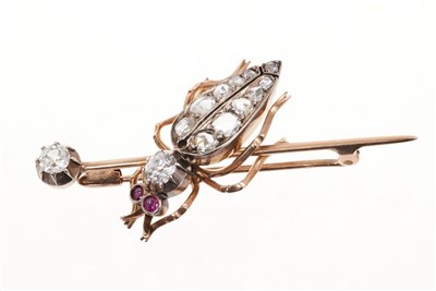 Lot 524 - Victorian style diamond novelty insect brooch modelled as a beetle with old cut and rose cut diamonds, ruby eyes, mounted on a gold pin with diamond terminal. Estimated total diamond weight approxi...