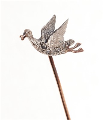 Lot 525 - Victorian style novelty stick pin, modelled as a flying duck with silver body and rose cut diamonds, mounted on a gold pin. French control marks.