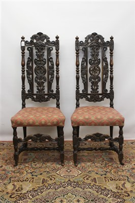 Lot 1345 - Pair of Charles II style carved beech side chairs