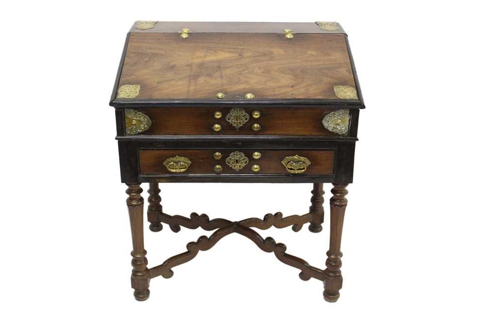 Lot 1348 - Rare 17th century Indo-Portuguese brass moulded hardwood desk on stand