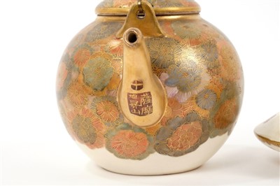 Lot 130 - Late 19th century Japanese satsuma earthenware teapot and another (2)