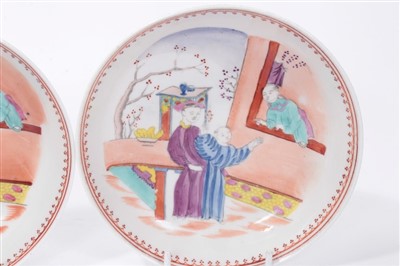 Lot 135 - A pair of New Hall type 'Boy at the Window' pattern tea bowls and saucers, circa 1800