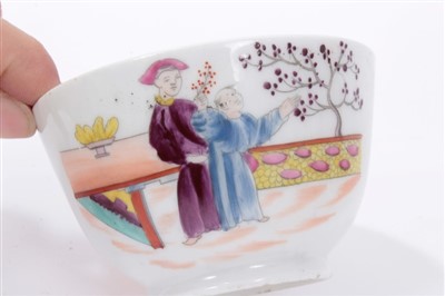 Lot 135 - A pair of New Hall type 'Boy at the Window' pattern tea bowls and saucers, circa 1800
