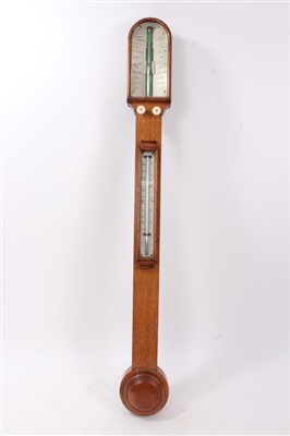 Lot 660 - Victorian Negretti and Zambia stick barometer /thermometer with ivory scale in oak case 92cm high