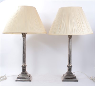 Lot 1433 - Pair of silver plated Corinthian column table lamps