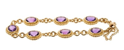 Lot 652 - 18ct Gold and amethyst bracelet